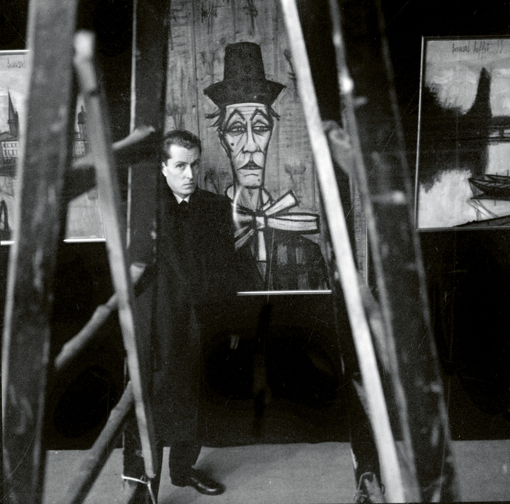 Bernard Buffet during an exhibition of his works (Retrospective) in Paris in January 1958 (b/w photo), / Photo © AGIP / Bridgeman Images